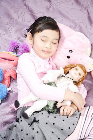 simsearch:642-01736683,k - Girl sleeping with dolls Stock Photo - Premium Royalty-Free, Code: 642-01735288
