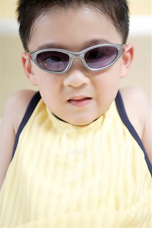 simsearch:642-01732852,k - Boy wearing sunglasses, close-up, portrait Stock Photo - Premium Royalty-Free, Code: 642-01735587