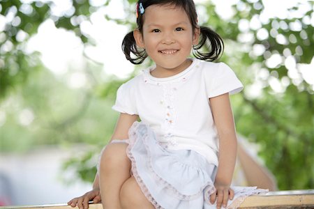 simsearch:642-01734328,k - Close-up of a girl smiling Stock Photo - Premium Royalty-Free, Code: 642-01735660