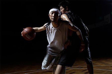 simsearch:642-01735997,k - Basketball players playing one on one Stock Photo - Premium Royalty-Free, Code: 642-01735943