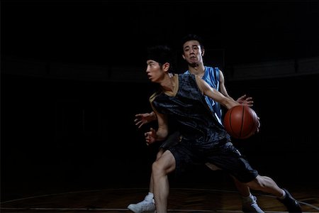simsearch:642-01735997,k - Basketball players playing one on one Stock Photo - Premium Royalty-Free, Code: 642-01735983