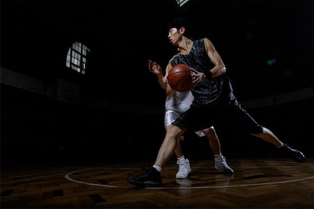 simsearch:642-01735997,k - Basketball players playing one on one Stock Photo - Premium Royalty-Free, Code: 642-01735992