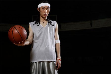 simsearch:642-01735997,k - Basketball player holding basketball Stock Photo - Premium Royalty-Free, Code: 642-01736008