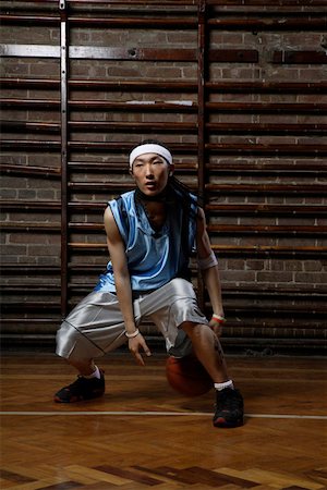 simsearch:642-01735997,k - Basketball player dribbling ball on court Stock Photo - Premium Royalty-Free, Code: 642-01736039