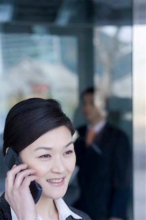 simsearch:642-01734897,k - Young woman using mobile phone Stock Photo - Premium Royalty-Free, Code: 642-01736627