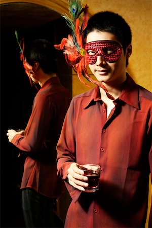 simsearch:642-01737214,k - Young man holding wineglass and wearing mask, portrait Stock Photo - Premium Royalty-Free, Code: 642-01737235