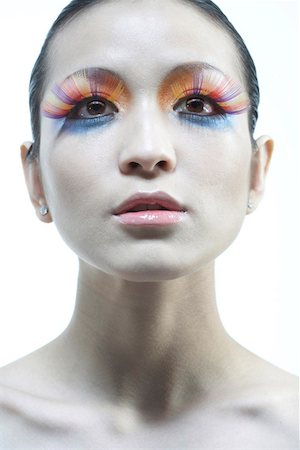 stylish eye makeup - Close-up of a young woman wearing lipstick and false eyelashes Stock Photo - Premium Royalty-Free, Code: 642-01732659