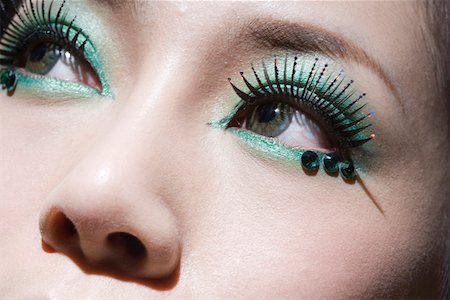 stylish eye makeup - Close-up of a young woman wearing false eyelashes Stock Photo - Premium Royalty-Free, Code: 642-01732680