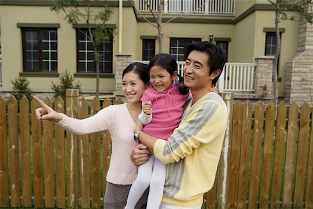 simsearch:642-01732733,k - Young couple with their daughter, smiling Foto de stock - Royalty Free Premium, Número: 642-01732768