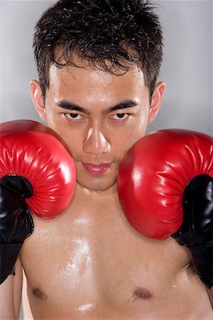 sweaty asian men - a male boxer Stock Photo - Premium Royalty-Free, Code: 642-02004920