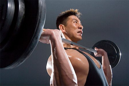sweaty asian men - a male weightlifter lifting Stock Photo - Premium Royalty-Free, Code: 642-02004988