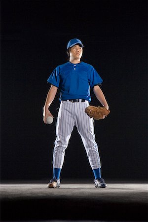 softball - a male softball player Fotografie stock - Premium Royalty-Free, Codice: 642-02005216