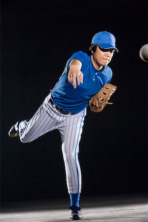softball - a male softball player Fotografie stock - Premium Royalty-Free, Codice: 642-02005220