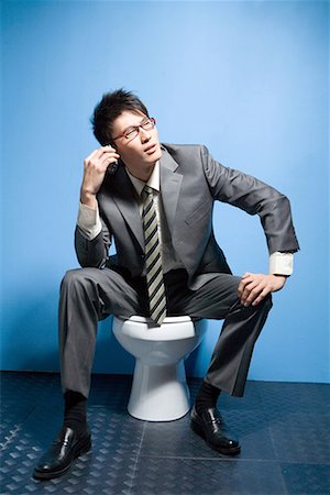 picture men on the toilet - a business man Stock Photo - Premium Royalty-Free, Code: 642-02005993