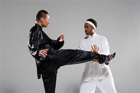 two men practicing Sanshou Foto de stock - Sin royalties Premium, Código: 642-02006365