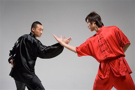 two men practicing Chinese Kungfu Foto de stock - Sin royalties Premium, Código: 642-02006377