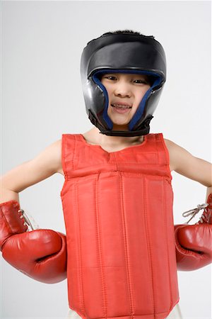 a boy practicing boxing Stock Photo - Premium Royalty-Free, Code: 642-02006504