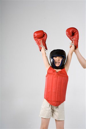 a boy practicing boxing Stock Photo - Premium Royalty-Free, Code: 642-02006509