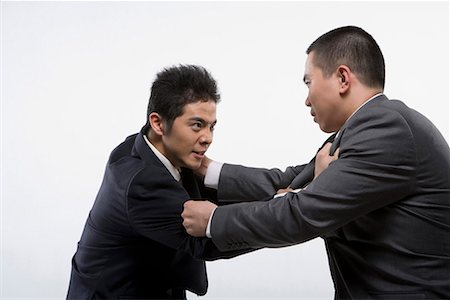 diverging - two business men wrestling Stock Photo - Premium Royalty-Free, Code: 642-02006552