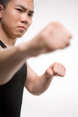 simsearch:642-02006573,k - a man practicing Chinese Kungfu Stock Photo - Premium Royalty-Free, Code: 642-02006574