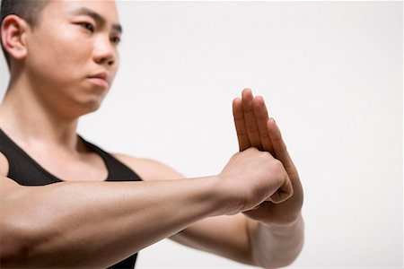 simsearch:642-02006573,k - a man practicing Chinese Kungfu Stock Photo - Premium Royalty-Free, Code: 642-02006571