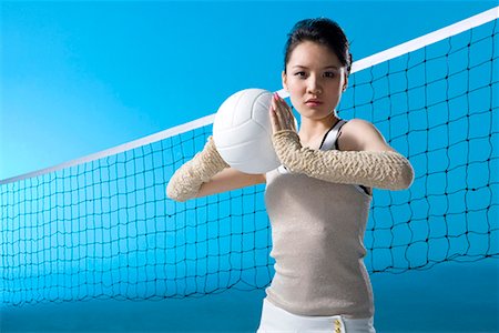 Volleyball Player in a Blue Sports Attire Stock Vector