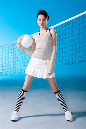 a female beach volleyball player Fotografie stock - Premium Royalty-Free, Codice: 642-02006757