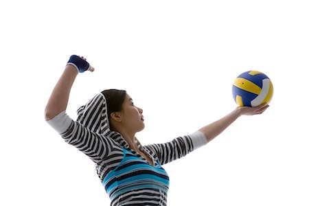 a fashionable woman with a volleyball in her hand Stock Photo - Premium Royalty-Free, Code: 642-02006764