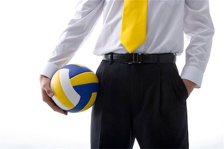 a gentleman with a volleyball in his hand Stock Photo - Premium Royalty-Free, Code: 642-02006761