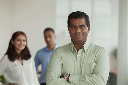simsearch:655-03457957,k - Singapore, Business people standing in office Stock Photo - Premium Royalty-Free, Code: 655-08356890