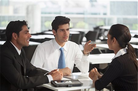 simsearch:655-08357080,k - India, Group discussion with two men and one woman Stock Photo - Premium Royalty-Free, Code: 655-08357158
