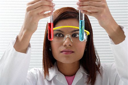 simsearch:655-02375854,k - Scientist with holding two viles Stock Photo - Premium Royalty-Free, Code: 655-02375847