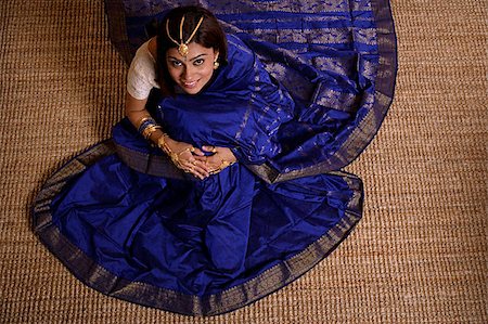 Indian woman wearing traditional wedding jewelry Stock Photo - Premium Royalty-Free, Code: 655-02375897