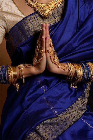 Torso of Indian woman wearing sari and jewelry Foto de stock - Sin royalties Premium, Código: 655-02375898