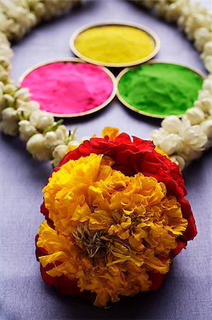 dyeing colorful pic - Indian colored powder paints with flower garland Stock Photo - Premium Royalty-Free, Code: 655-02703003