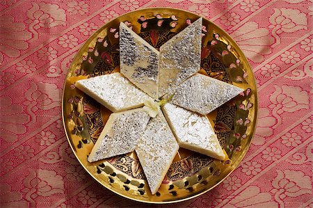 empty plate of food - Indian sweets in star shape. Stock Photo - Premium Royalty-Free, Code: 655-03082807