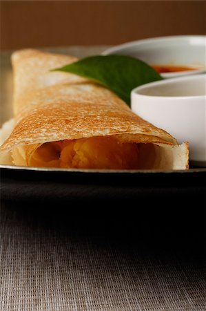 close up of masala dosai,indian food Stock Photo - Premium Royalty-Free, Code: 655-03082836