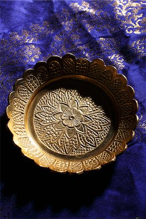 Carved brass bowl Stock Photo - Premium Royalty-Free, Code: 655-03457894