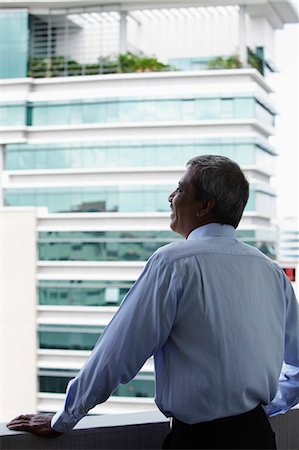 simsearch:655-03457957,k - Back shot of Indian man looking at building Stock Photo - Premium Royalty-Free, Code: 655-03457924