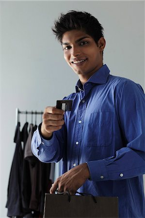 simsearch:700-00160036,k - young man paying with credit card in shop Stock Photo - Premium Royalty-Free, Code: 655-03519684