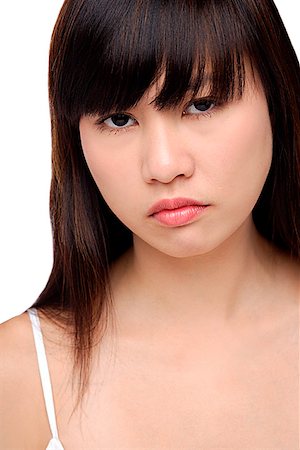 simsearch:656-01770941,k - Young woman frowning, portrait Foto de stock - Sin royalties Premium, Código: 656-01765537