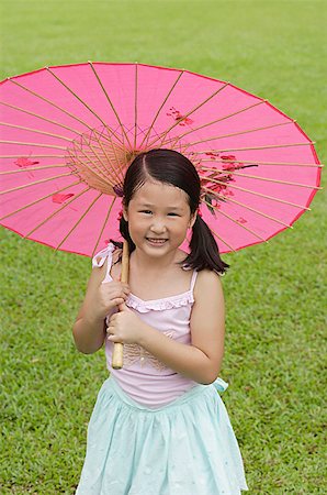 simsearch:656-01766387,k - Jeune fille à l'aide de rose Zhisan chinois traditionnel Photographie de stock - Premium Libres de Droits, Code: 656-01765540