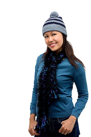 simsearch:656-01765511,k - Young woman wearing winter hat and scarf, smiling at camera Stock Photo - Premium Royalty-Free, Code: 656-01765957