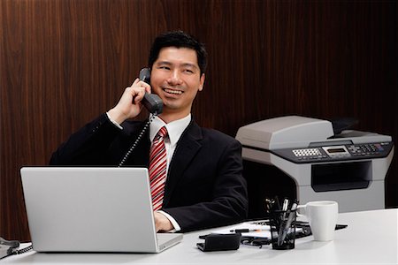 simsearch:655-01781562,k - A businessman on the telephone Stock Photo - Premium Royalty-Free, Code: 656-01766263