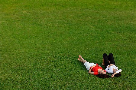 simsearch:656-01765624,k - Two women relaxing in the park Stock Photo - Premium Royalty-Free, Code: 656-01766903