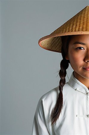 Young woman in traditional Chinese dress looking at camera Foto de stock - Sin royalties Premium, Código: 656-01767065