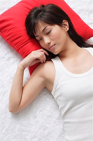 someone laying down aerial view - Young woman dreaming Stock Photo - Premium Royalty-Free, Code: 656-01767138
