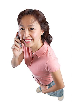 simsearch:656-03519571,k - Woman looking at camera, holding mobile phone Foto de stock - Sin royalties Premium, Código: 656-01767545