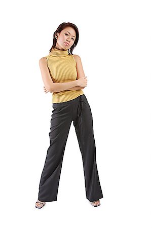 singapore women 30s - Young woman standing, arms crossed Stock Photo - Premium Royalty-Free, Code: 656-01767561