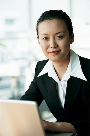 executive mentor - Businesswoman using laptop Stock Photo - Premium Royalty-Free, Code: 656-01767684